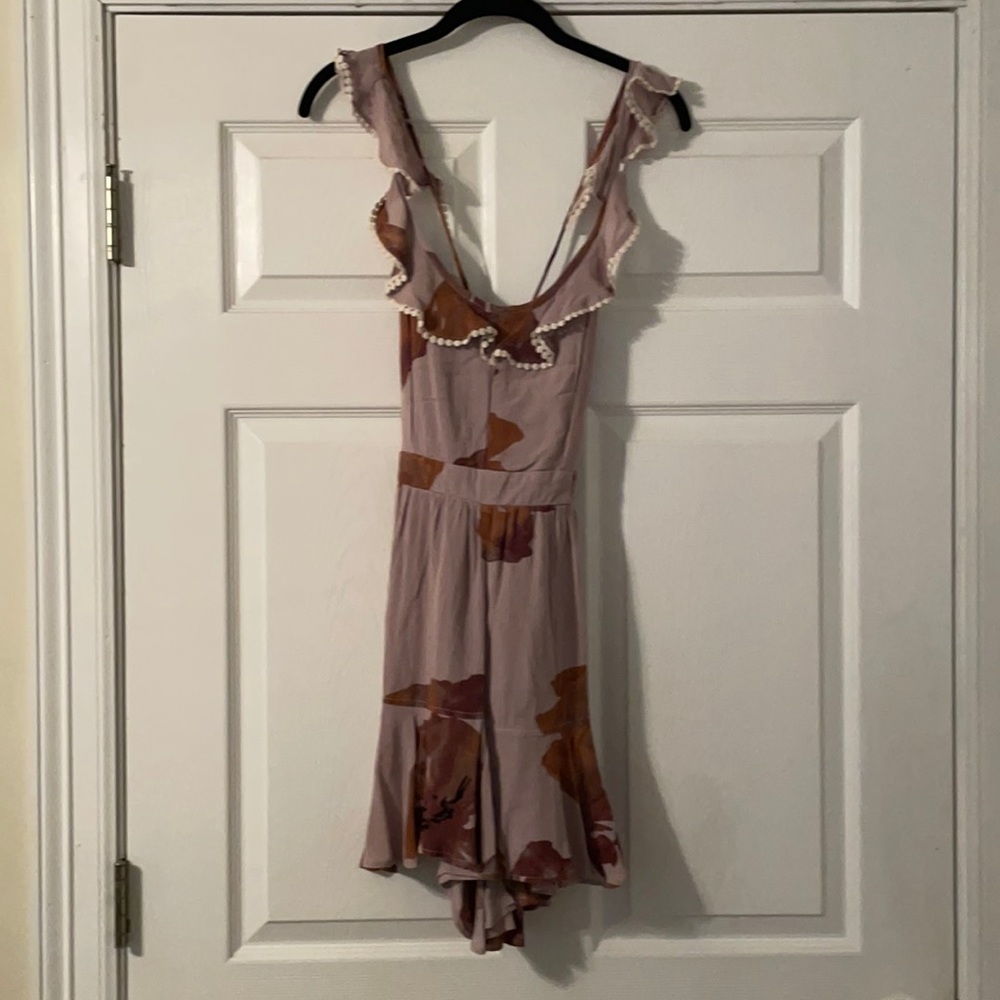 Skort-flowered and never worn.